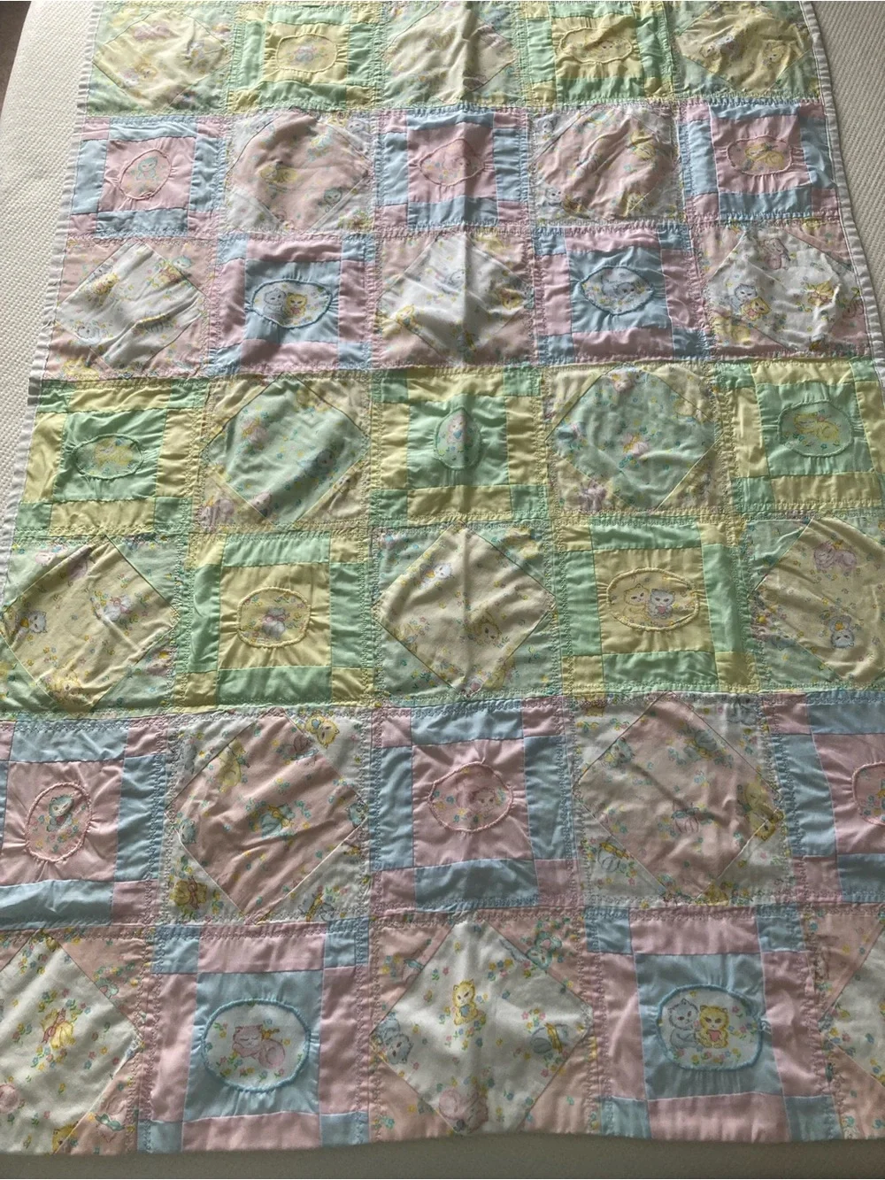 Handmade pastel kitten print baby quilt